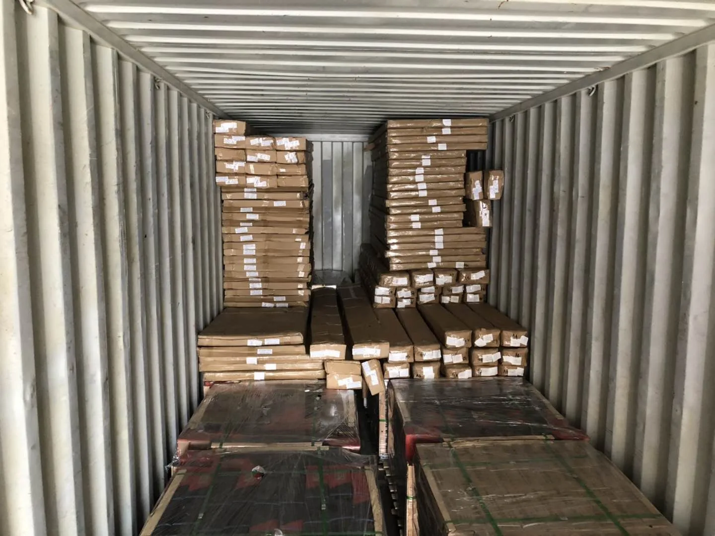 Packed goods loaded in a shipping container