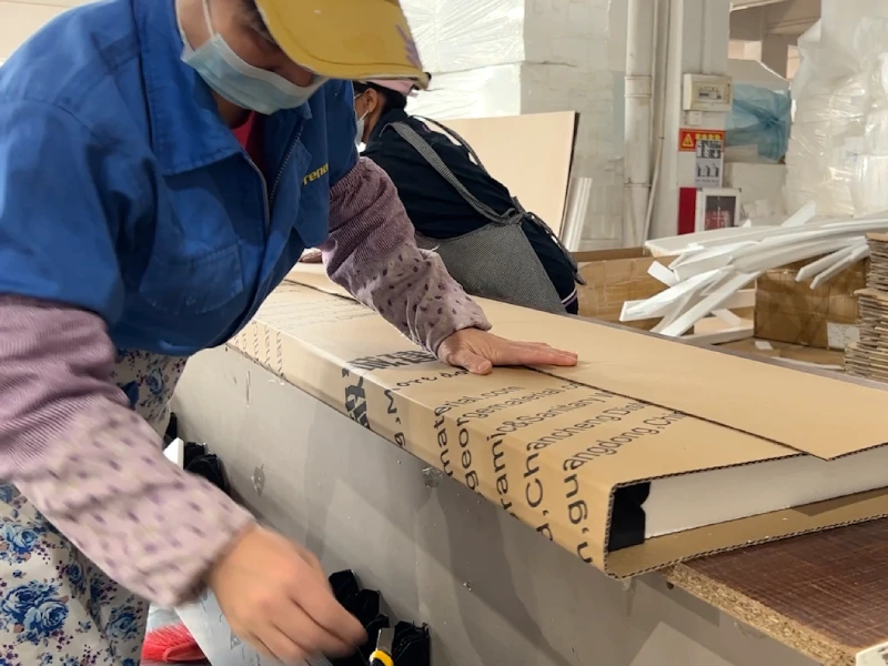 Protective export packing for kitchen cabinets before overseas shipping.