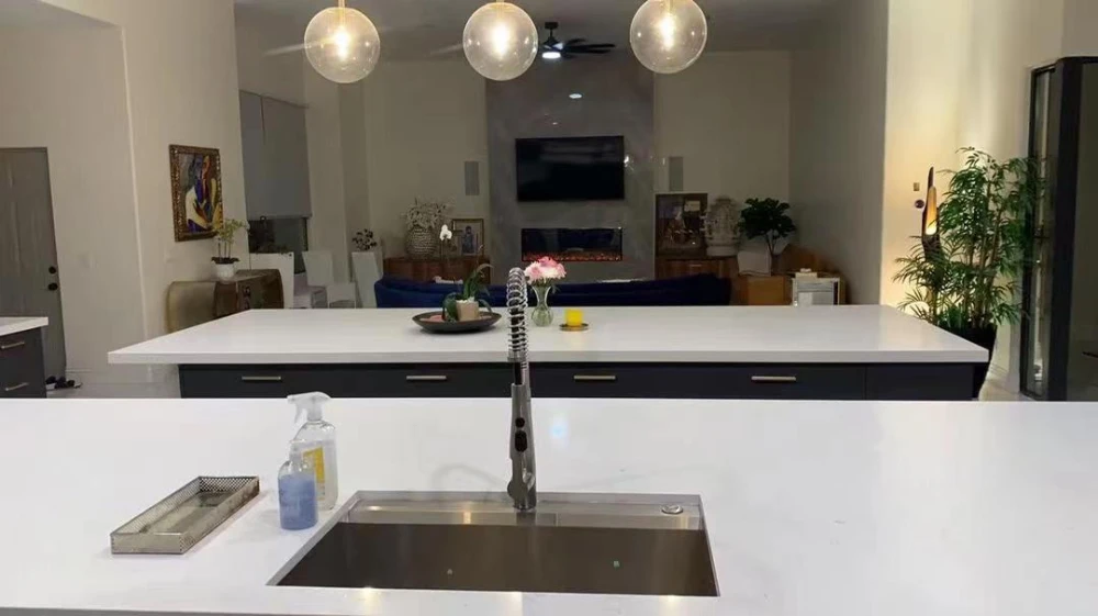 Apartment kitchen sink and island detail