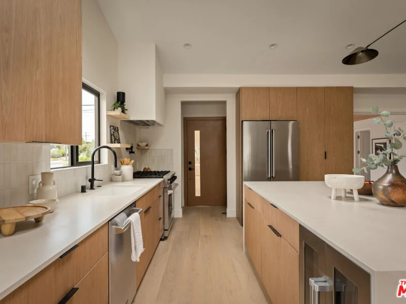 USA private residence kitchen island and custom cabinet layout by George Group
